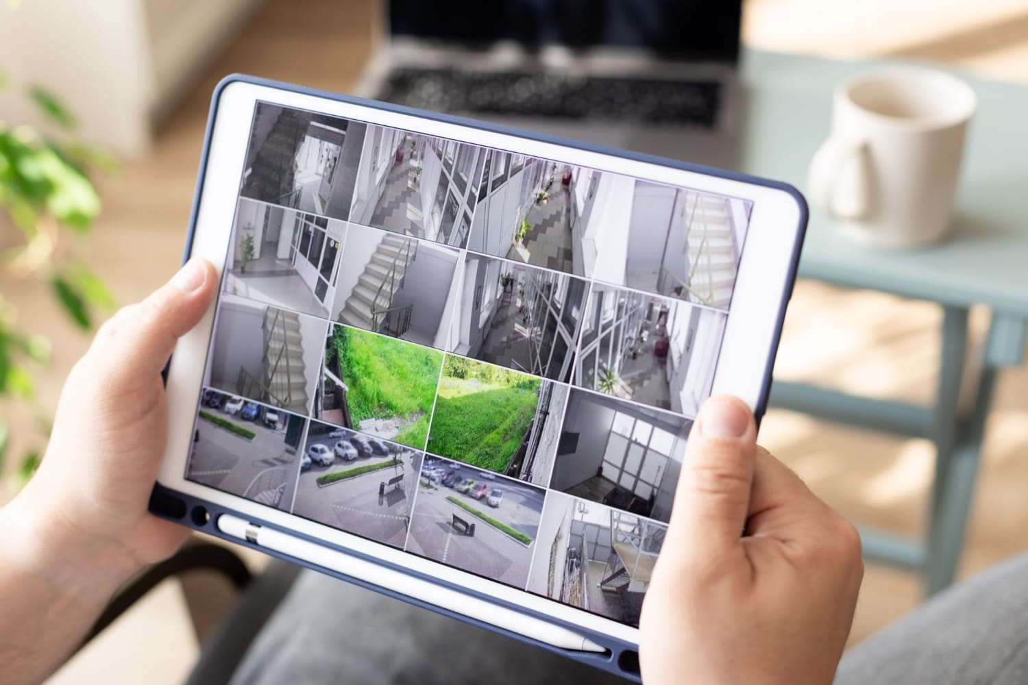 man-monitoring-modern-cctv-cameras-digital-tablet-indoors-surveillance-security-system